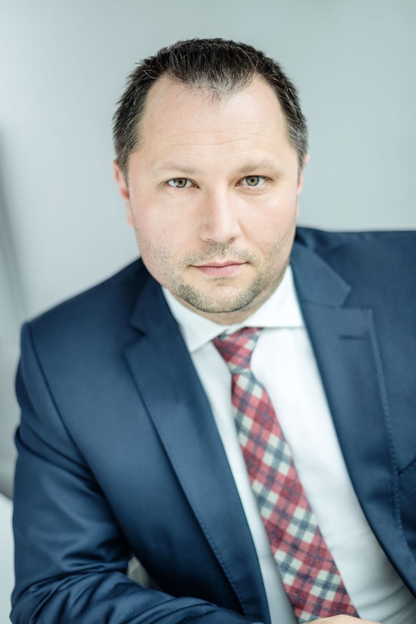 Tomasz Czuba, JLL