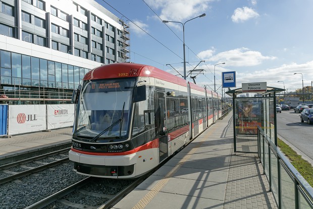 Station located in front of the building’s main entrance serves number of tram lines